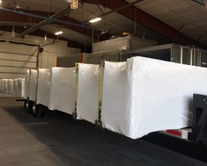 LARGE STRUCTURE SHRINK WRAPPED FOR TRANSPORT